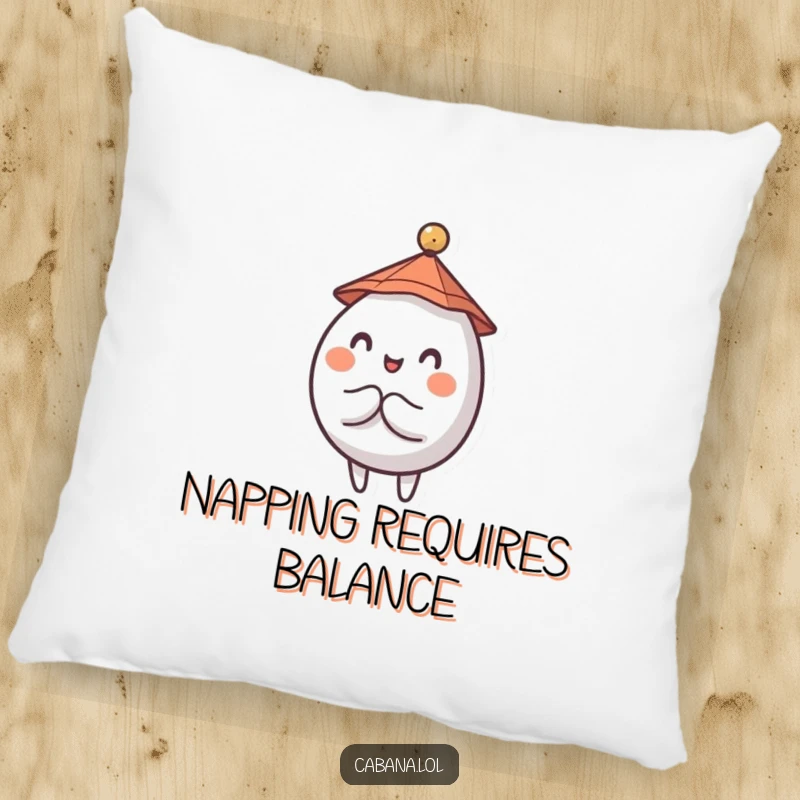 Funny pillow showcasing a wobbly, round character, wearing a tiny hat, balancing a small umbrella.